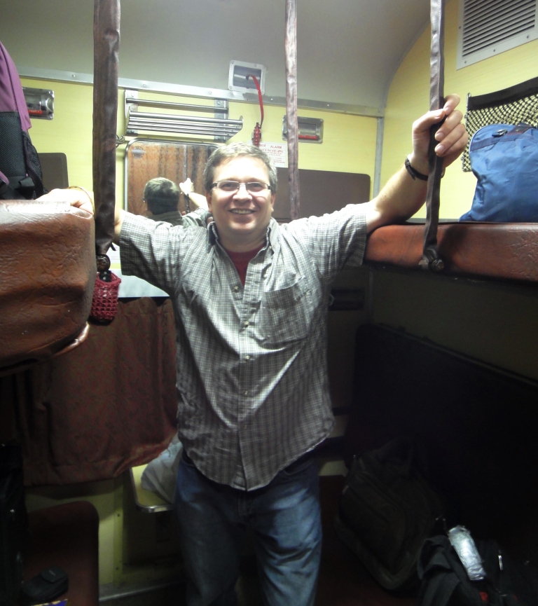 Dr. Keith Fowke on the India night train during the site visits in India as part of the course offering in February 2011.